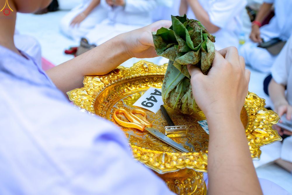 ภาพ No.319766:วันอาทิตย์ที่ 5 เมษายน พ.ศ.2569 พิธีตัดปอยผม และปลงผมนาคธรรมทายาท โครงการบรรพชาและอุปสมบทหมู่ รุ่นบูชาธรรม 82 ปี หลวงพ่อธัมมชโย