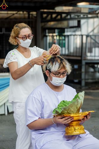 ภาพ No.78634:พิธีตัดปอยผมและปลงผมนาคธรรมทายาท  โครงการบรรพชาและอุปสมบทหมู่ วันคุ้มครองโลก วันที่ 26 มีนาคม พ.ศ.2566 ณ หมู่บ้านบรรลุธรรม วัดพระธรรมกาย