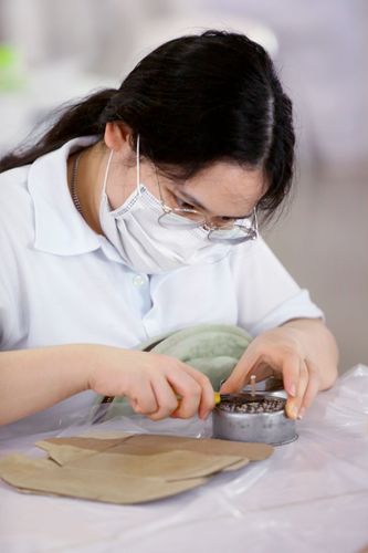 ภาพ No.31180:กิจกรรมงานบุญ ร่วมกันทำไส้เทียนและหล่อเทียนกระป๋อง