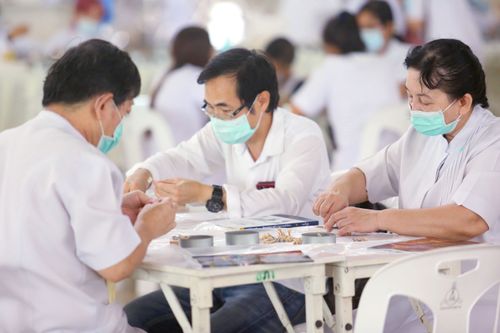 ภาพ No.31197:กิจกรรมงานบุญ ร่วมกันทำไส้เทียนและหล่อเทียนกระป๋อง