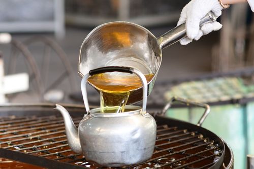 ภาพ No.31199:กิจกรรมงานบุญ ร่วมกันทำไส้เทียนและหล่อเทียนกระป๋อง