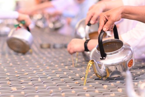 ภาพ No.31206:กิจกรรมงานบุญ ร่วมกันทำไส้เทียนและหล่อเทียนกระป๋อง