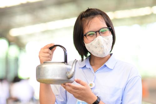 ภาพ No.31210:กิจกรรมงานบุญ ร่วมกันทำไส้เทียนและหล่อเทียนกระป๋อง