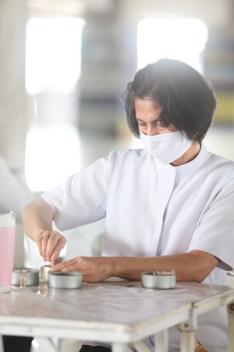 ภาพ No.31258:กิจกรรมงานบุญ ร่วมกันทำไส้เทียนและหล่อเทียนกระป๋อง