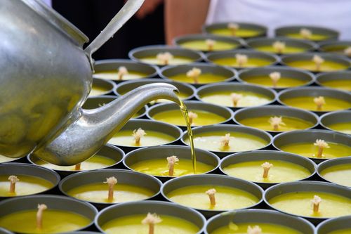 ภาพ No.31252:กิจกรรมงานบุญ ร่วมกันทำไส้เทียนและหล่อเทียนกระป๋อง