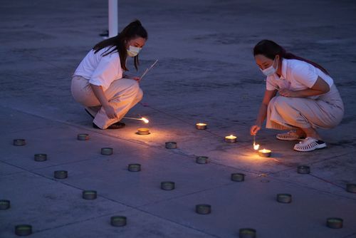 ภาพ No.29075:วันคุ้มครองโลก พิธีจุดประทีปแปรอักษรที่ใหญ่ที่สุดในโลก ถวายเป็นพุทธบูชา ผ่านระบบ ZOOM 