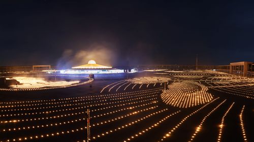 ภาพ No.29166:วันวิสาขบูชา จุดวิสาขประทีปถวายเป็นพุทธบูชา แปรอักษรเป็นภาพพระสัมมาสัมพุทธเจ้า ประสูติ ตรัสรู้ ปรินิพพาน