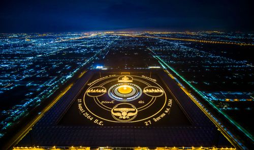 ภาพ No.29356:วันธรรมชัย พิธีจุดประทีปโคมไฟ ถวายเป็นพุทธบูชา แปรอักษรเป็นภาพ