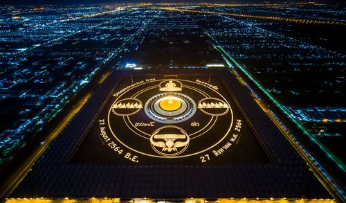 ภาพ No.29358:วันธรรมชัย พิธีจุดประทีปโคมไฟ ถวายเป็นพุทธบูชา แปรอักษรเป็นภาพ