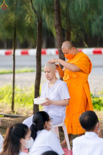 ภาพ No.82613:พิธีตัดปอยผมและปลงผมนาคธรรมทายาท ในโครงการอุปสมบทหมู่ธรรมทายาทพุทธศาสตร์สากล รุ่นที่ 7 (ภาคฤดูฝน) วันอาทิตย์ที่ 11 มิถุนายน พ.ศ. 2566 ณ  วัดพระธรรมกาย