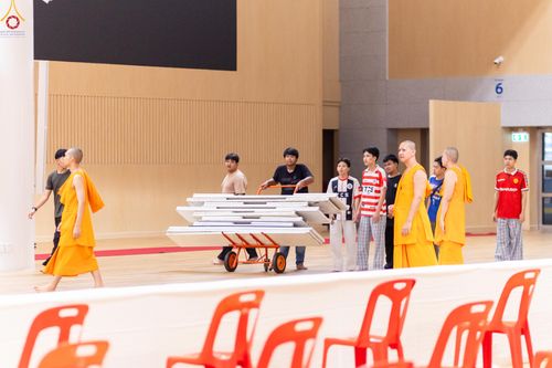 ภาพ No.322763:วันที่ 15-18 เมษายน พ.ศ.2569 การเเตรียมโต๊ะฉัน , เตรียมจุดพักค้าง , เรียงเก้าอี้ , เรียงกล่องไทยธรรม  เพื่องานถวายมหาสังฆทาน 40,000 กว่าวัดทั่วประเทศ วันคุ้มครองโลก 22 เมษายน พ.ศ.2569 วัดพระธรรมกาย