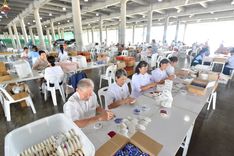 ภาพ No.239934:วันที่ 20-23 สิงหาคม พ.ศ. 2568 การเตรียมงานวันธรรมชัย ใส่ถ่านประทีป LED ที่วิหารคด 7 และ 25 วัดพระธรรมกาย